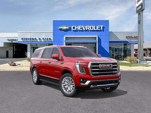 2026 GMC Yukon XL Elevation in Volcanic Red Tintcoat — front three-quarter view