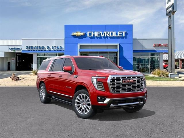 2026 GMC Yukon XL Denali in Volcanic Red Tintcoat — front three-quarter view