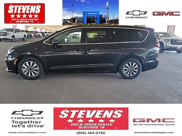 2023 Chrysler Pacifica Hybrid Touring L in Black — front three-quarter view